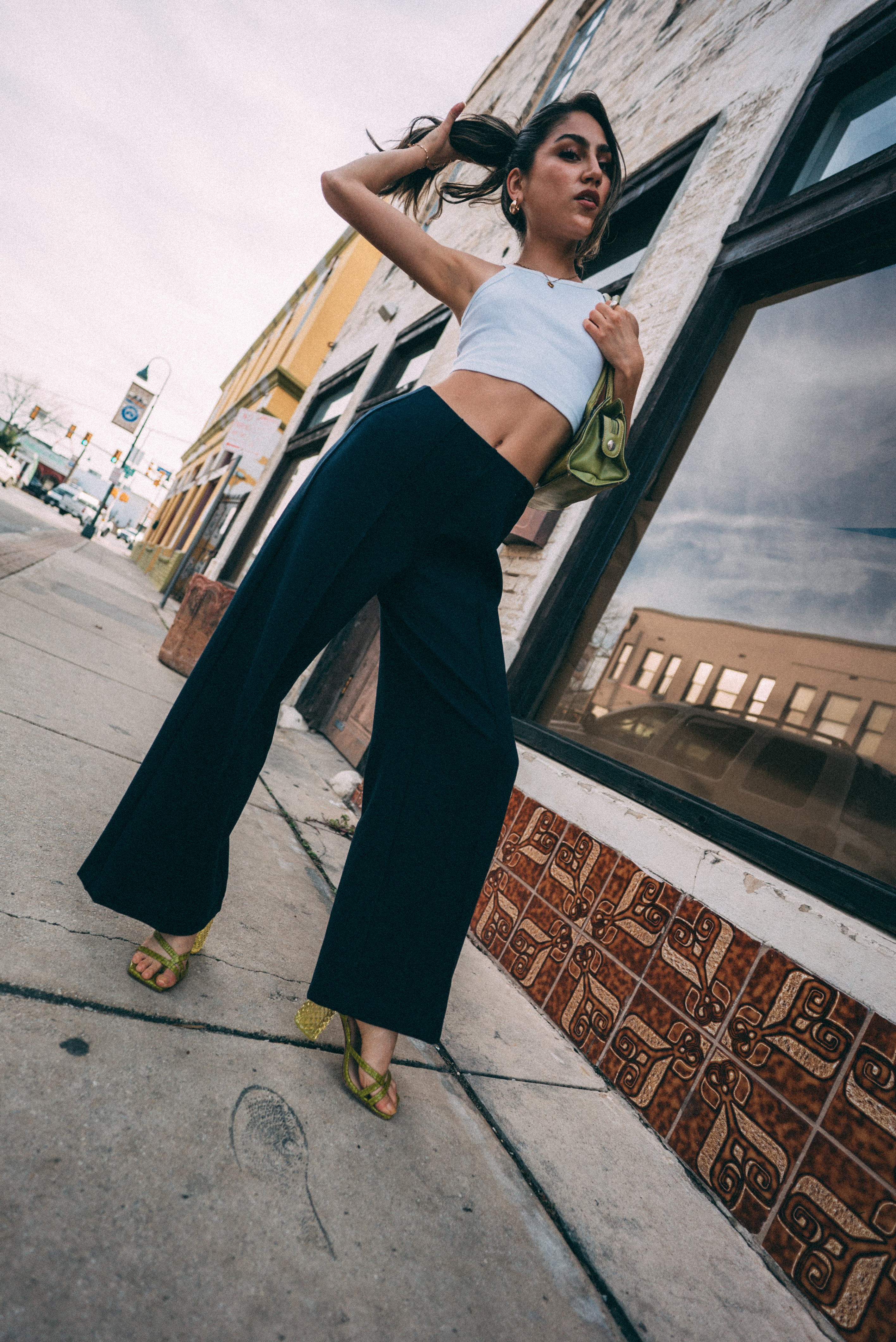 Creative senior portrait with editorial posing